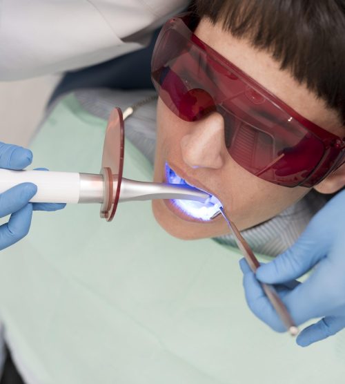 female-patient-having-procedure-done-dentist
